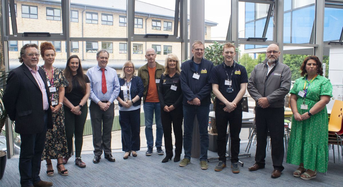 SERC staff members and local employers standing in the SPACE atrium.